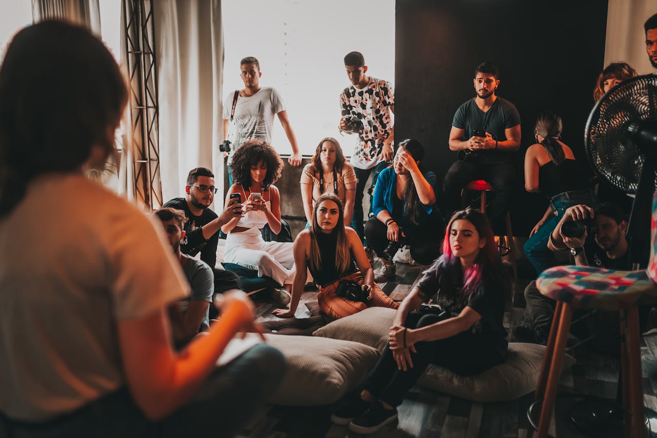 Group of people gathered in a studio